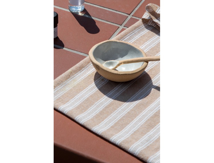 Handmade ceramic bowl with spoon