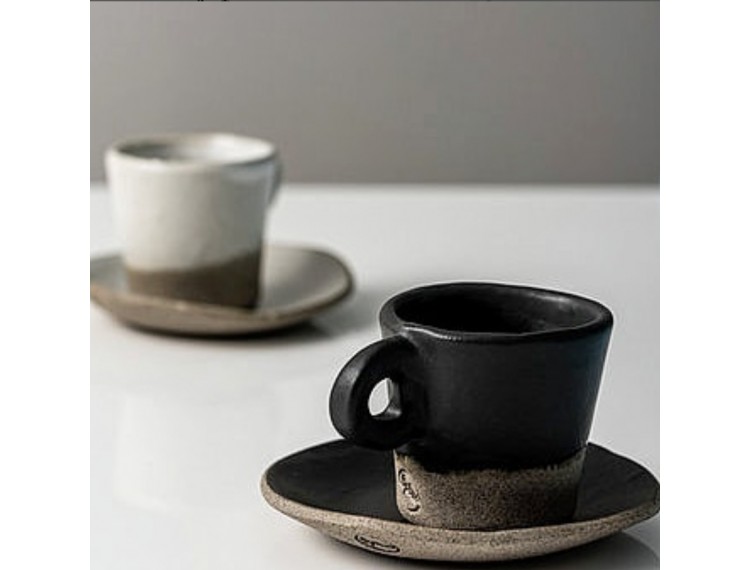 Ceramic handmade cups with a round...