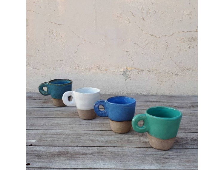 Ceramic handmade cups with a round...