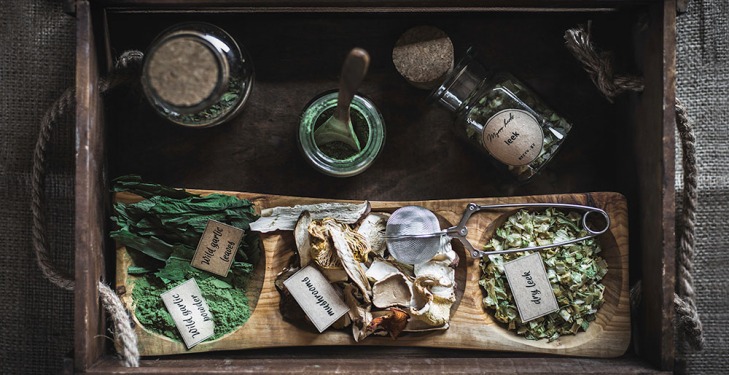 Rustic scrambled eggs with forest mushrooms and wild garlic